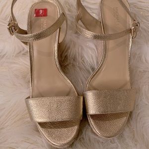 Worn briefly once.  Gold Wedge Sandal